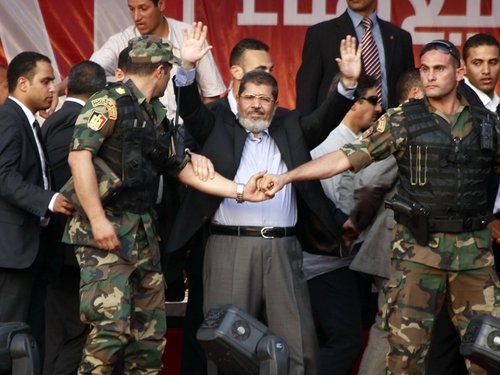 165171_egypt_s_new_president_mohammed_morsi_greets_nation_in_tahrir_square.jpg