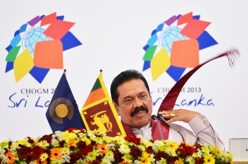 Sri Lanka President Mahinda Rajapaksa listens during a press conference.