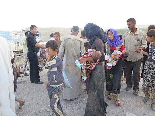 Yezidi IDPs who fled Mount Sinjar arrive in Feshkhabour