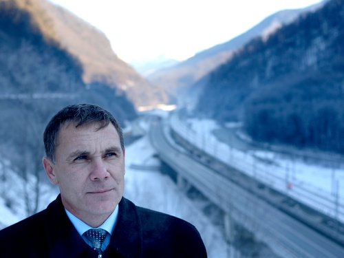 201387_yevgeny_vitishko_standing_in_front_of_the_new_road_between_adler_a_WETNvVC.jpg