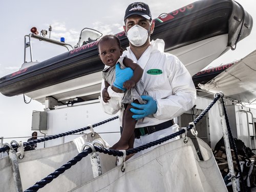 209374_african_migrants_in_the_mediterranean_sea.jpg