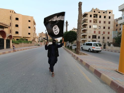 211359_a_member_loyal_to_the_islamic_state_in_iraq_and_the_levant_isil_wa_XstT6ee.jpg