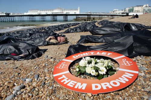 SOS Europe - Die-in, Brighton Beach, England.