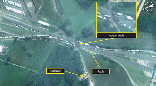 218073_crowds_of_people_at_roeszke_border_crossingresized_kee.png