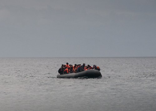 Refugees arriving by boat to Lesvos, Greece, from Turkey.