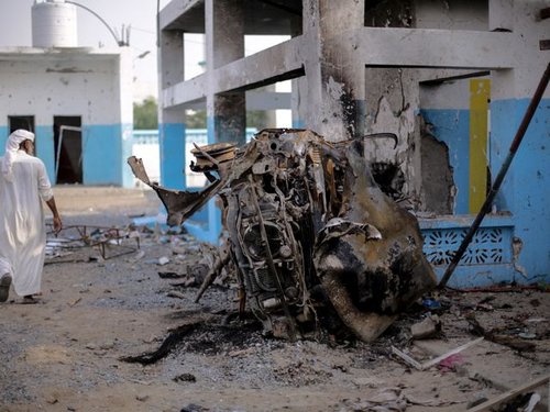 232559_photo_of_man_and_charred_car_msf_hospital_abs_yemen.jpg