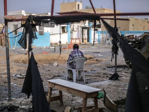 232560_guard_staring_out_at_impact_site-_msf_hospital_abs_yemen.jpg
