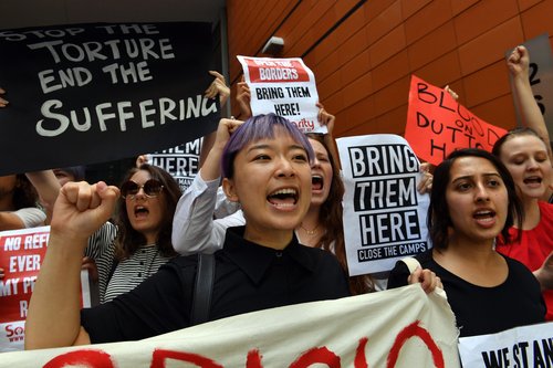 Refugee advocates protest demanding the immediate evacuation of Manus Island refugees to Australia