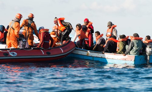 Sea-Eye crew rescue 17 people from a wooden boat in the central Mediterranean.