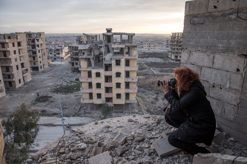 Amnesty International Senior Crisis Response Researcher, Donatella Rovera, photographing the destruction of Raqqa. January 21, 2019.