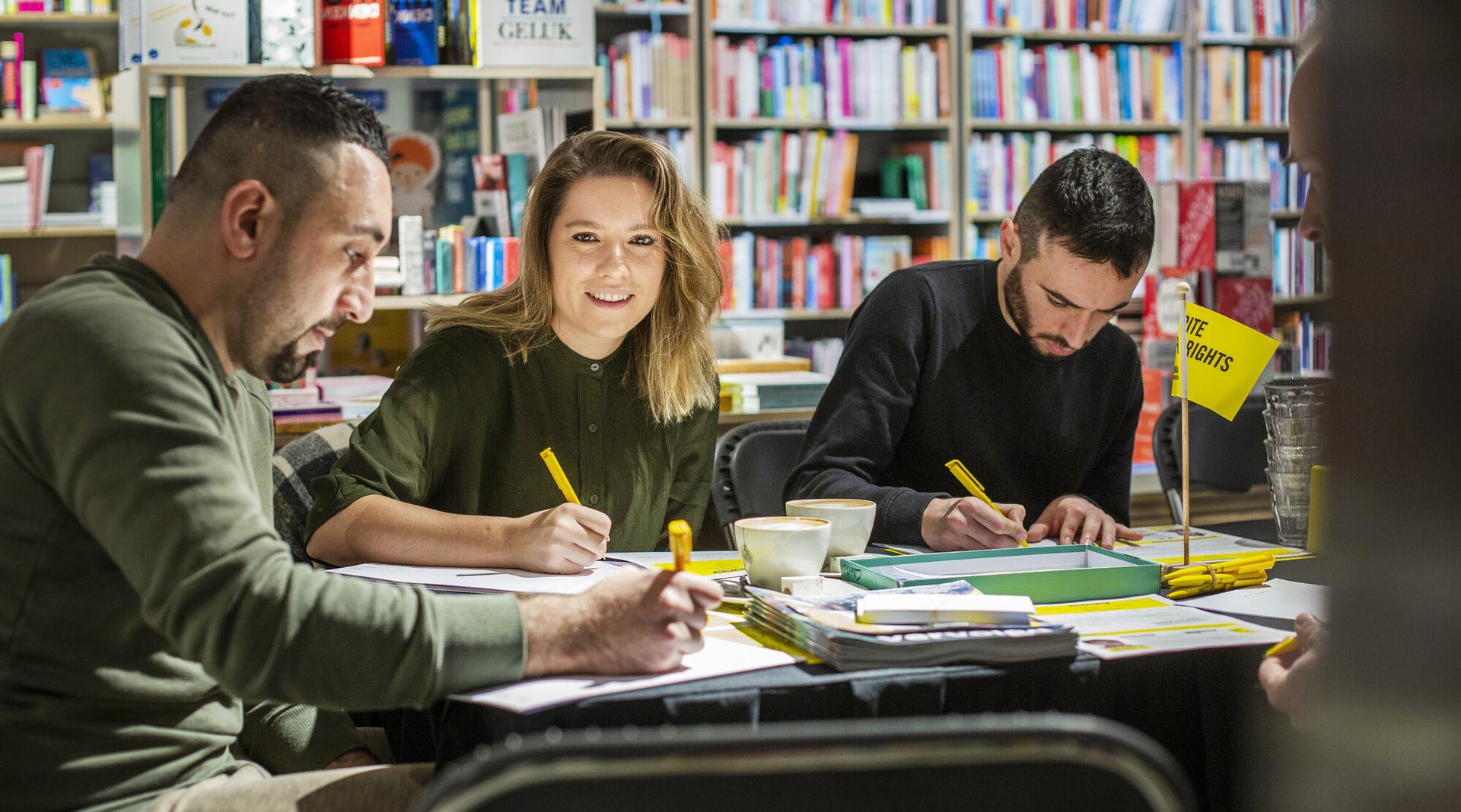 Amnesty Netherlands supporters and members take part in Write for Rights events at a bookshop in Eindhoven, 10 December 2019.