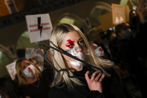 People demonstre at the Main Square during another day of the protests against restrictions on abortion law in Poland.