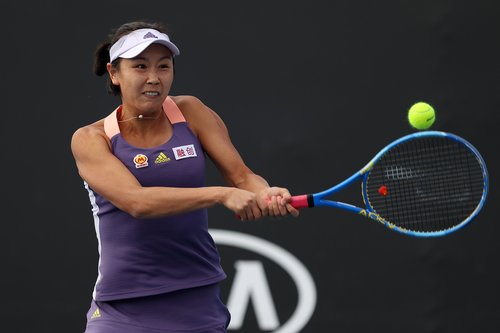 Shuai Peng of China plays a backhand during her Women's Doubles first round match  in Melbourne, Australia.