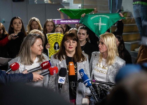 Justyna speaking to media