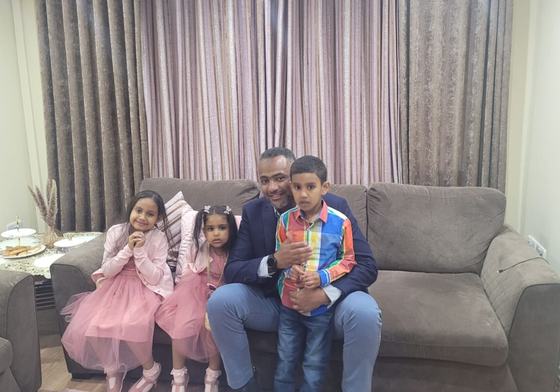 Photo of Ahmed al-Doush with his children