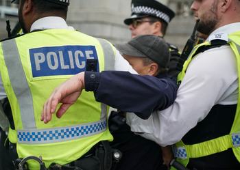 Protester being arrested by police