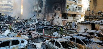 Firefighters attempt to extinguish a fire following an Israeli strike at the Corniche al-Mazraa neighbourhood of Beirut on April 8, 2026.