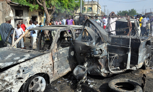 Burnt vehicles after a bomb attack in Maiduguri