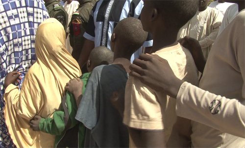 Children detained at Giwa barracks in a queue during their release ceremony