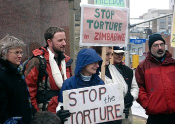 AI Canada protesting against torture in Zimbabwe
