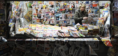 A Russian vendor sells newspapers and magazines in Moscow on 3 March 2010. AFP PHOTO / NATALIA KOLESNIKOVA
