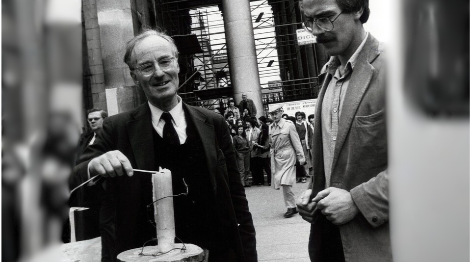 Peter Beninson lighting candle