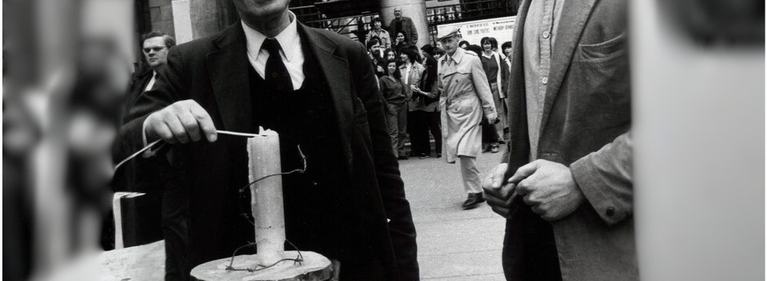 Peter Beninson lighting candle