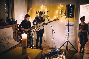 Members and supporters of Amnesty International Czech Republic take part in the organisations annual write for rights campaign, 10 December 2019.