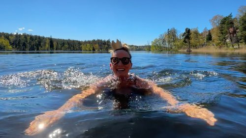 Person swimming outdoors