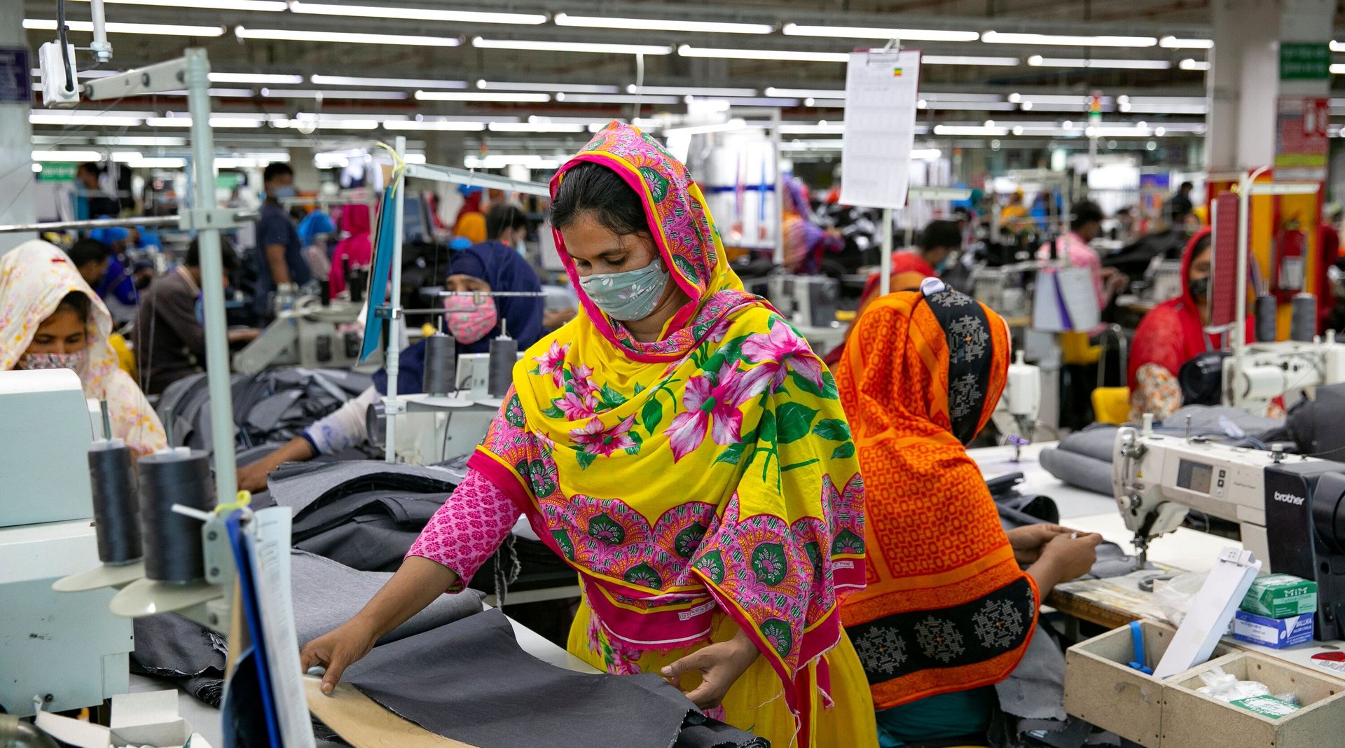 Garment workers work at a factory during a countrywide lockdown to try to contain the spread of Covid-19 on July 5, 2021 in Dhaka, Bangladesh.
