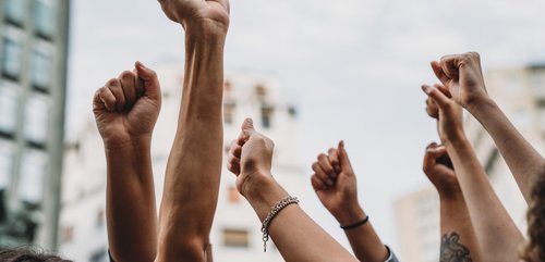 Hands raised in the air