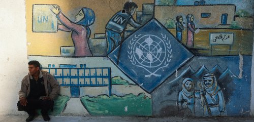 Street art with UNWRA logo in OPT