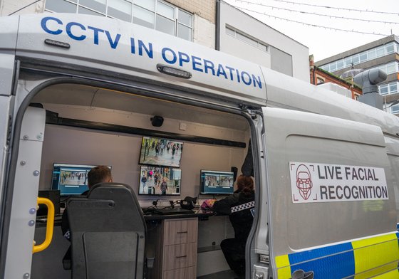 Police officers watch monitors in a live facial recognition van on the High Street on December 7, 2024 in Southend, England, United Kingdom. Essex Police today deployed two live facial recognition vans along the High Street. (Photo by John Keeble/Getty…