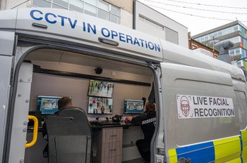 Police officers watch monitors in a live facial recognition van on the High Street on December 7, 2024 in Southend, England, United Kingdom. Essex Police today deployed two live facial recognition vans along the High Street. (Photo by John Keeble/Getty…