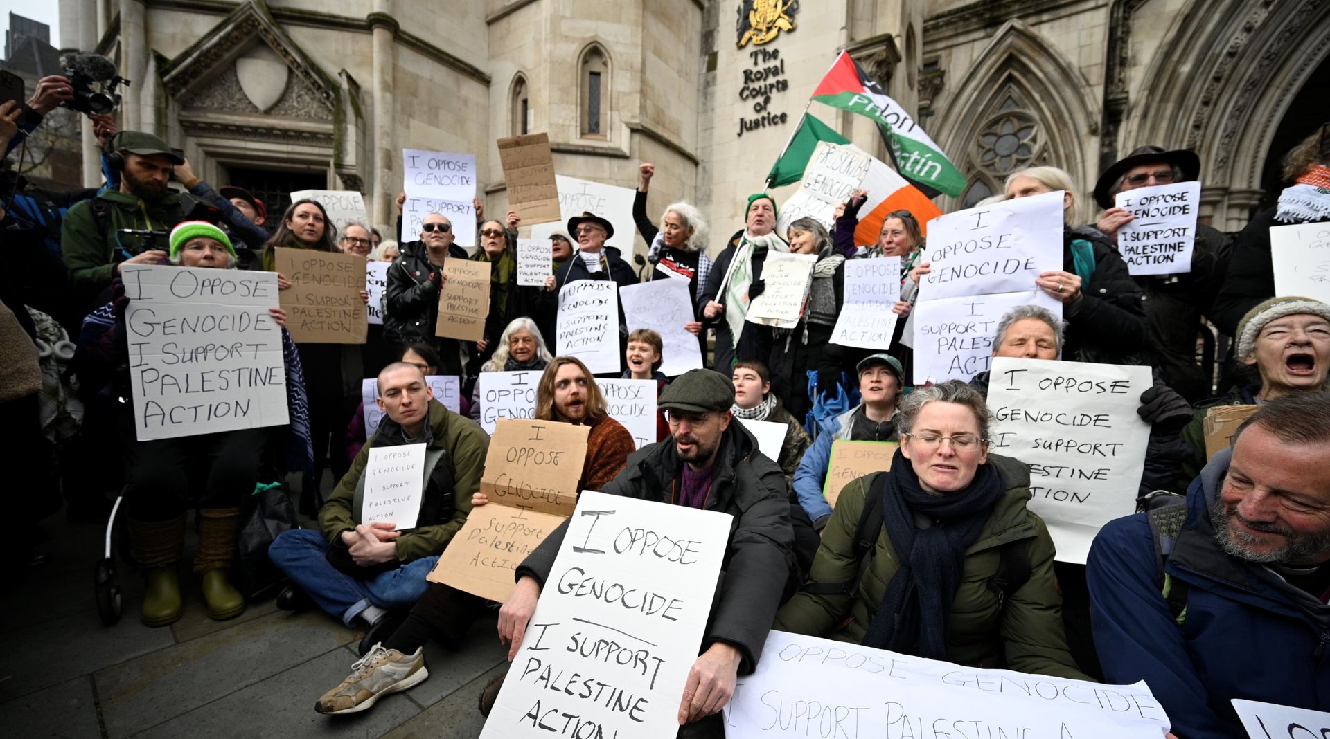 Demonstrators gather outside the High Court during a ruling on whether the government's ban of Palestine Action was unlawful on February 13, 2026 in London, United Kingdom.