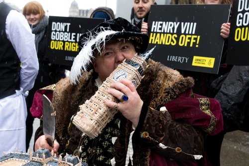 Amnesty stunt in Westminster warns of 'Henry viii powers'