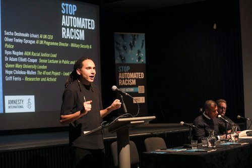 Image of Dr Adam Elliott-Cooper speaking at Amnesty UK's Automated Racism event launch event