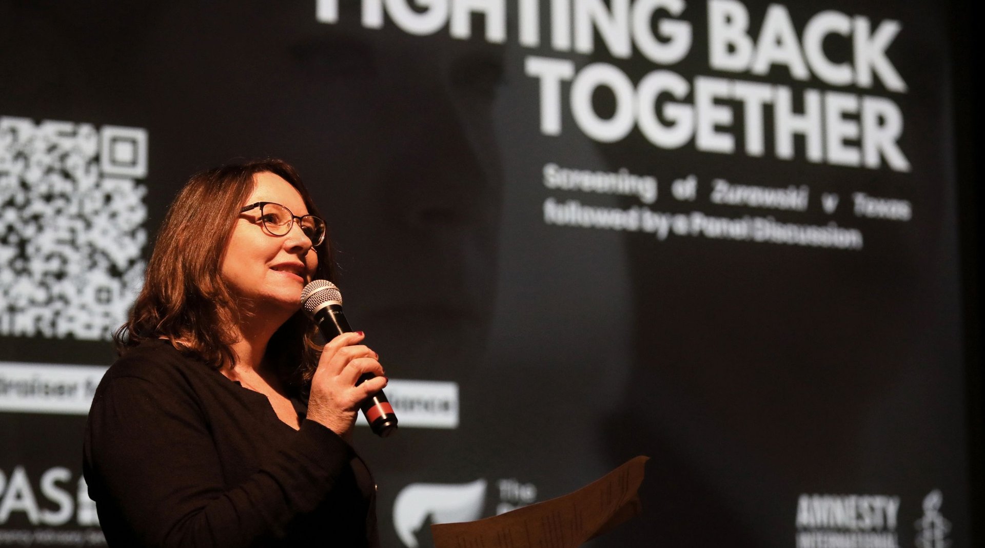 Kerry Moscogiuri speaking at an Amnesty UK event