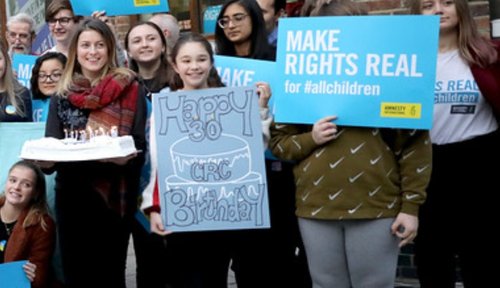 CHRN members holding banners for the Make Rights real campaign