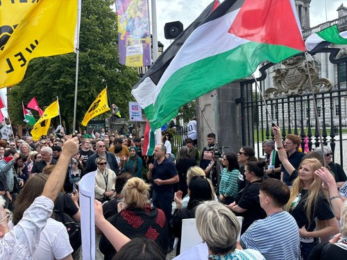 Patrick Corrigan calls for "solidarity with the Muslim community, with the refugee community and with every community" at the ant-racism rally in Belfast