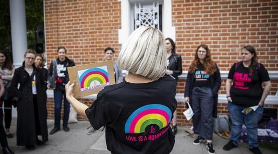 Activist talking to other actvists
