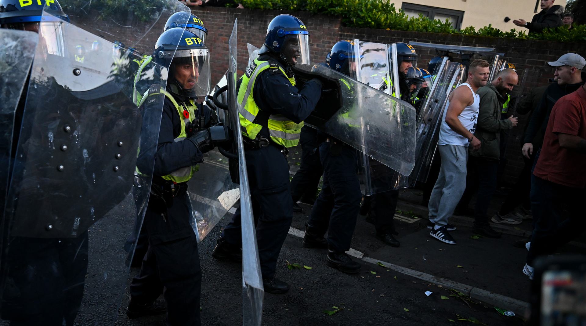 Far right and nationalist protestors confront riot police near the location where Henry Nowak died, during a demonstration over the police's handling of the incident, on June 02, 2026 in Southampton