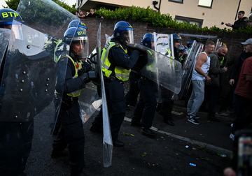 Far right and nationalist protestors confront riot police near the location where Henry Nowak died, during a demonstration over the police's handling of the incident, on June 02, 2026 in Southampton