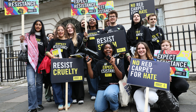 Student action network members outside AIUK offices
