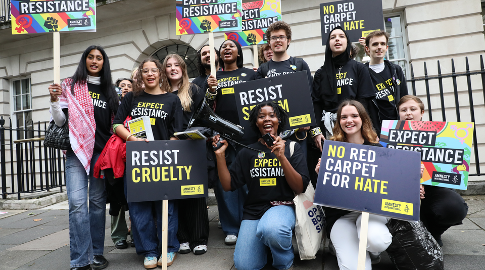 Student action network members outside AIUK offices