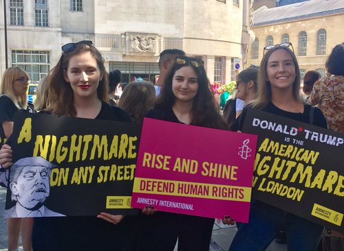 Women protesting President Trump's visit to the UK