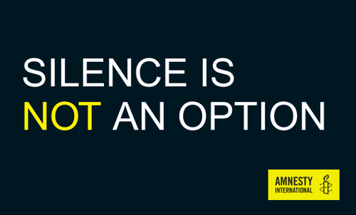 'Silence is not an option' placard by Amnesty International