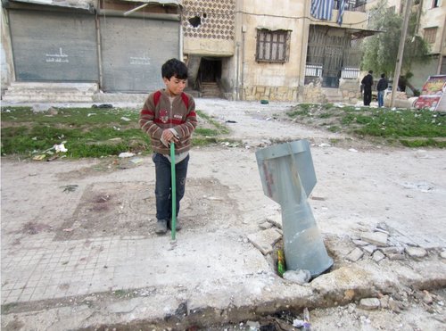 aleppo_boy_cluster_bomb_0.JPG
