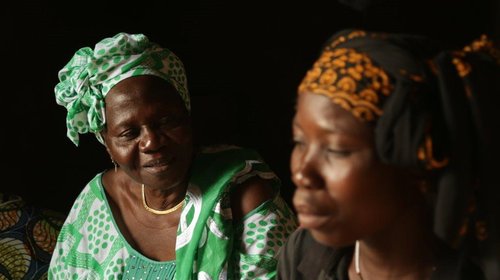 Women's rights activist Bibata Ouedraogo speaks with Abibou Sanga at counselling