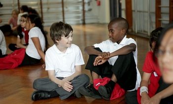 School children sitting in their school hall
